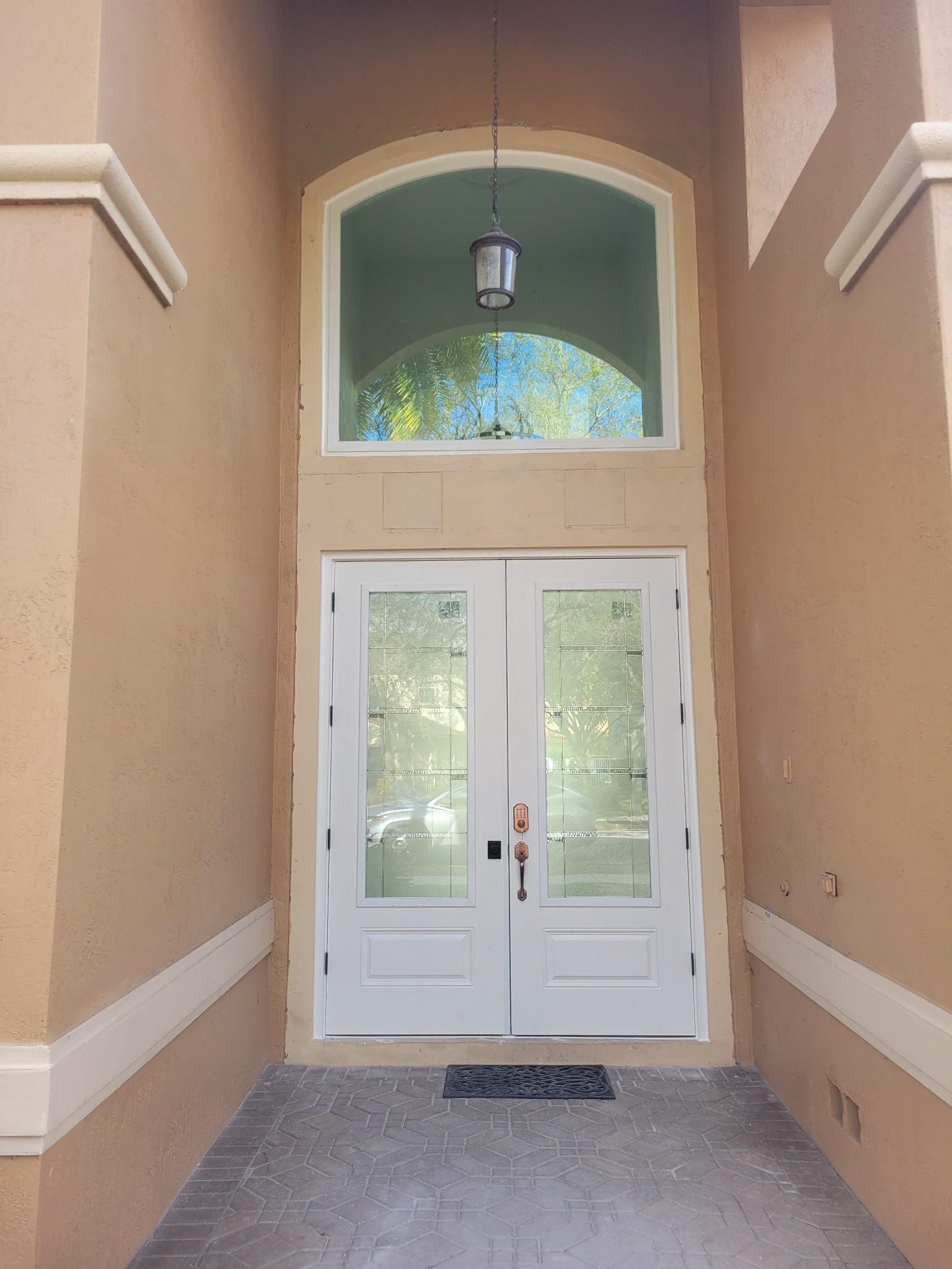 Double French door with arch window