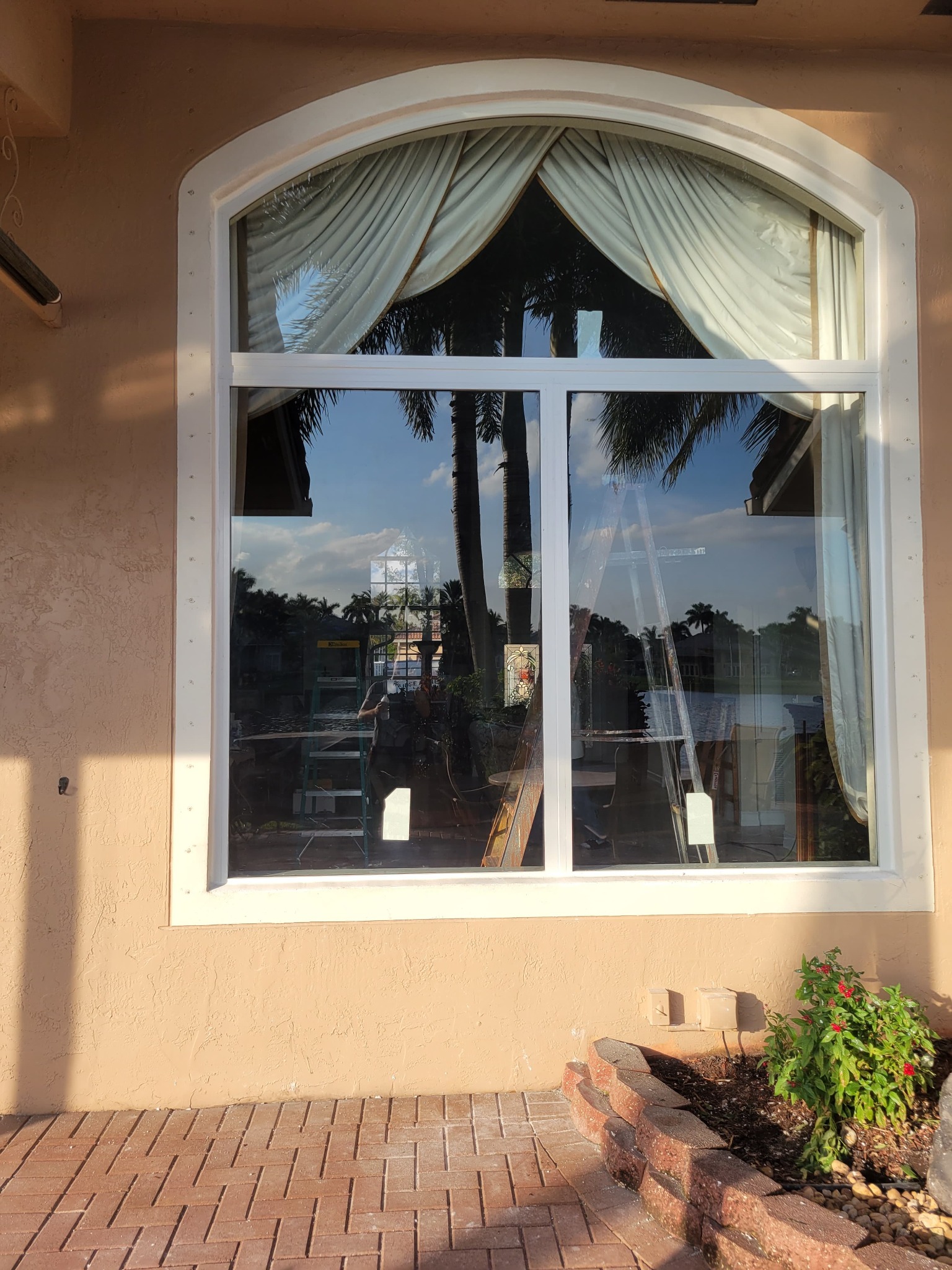 Impact window with arch on top